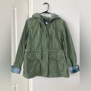 Patagonia Green Jacket with Blue Plaid Accents